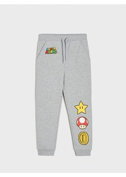 Sinsay - Spodnie dresowe jogger Super Mario - szary ze sklepu Sinsay w kategorii Spodnie chłopięce - zdjęcie 161215674