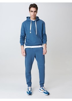 Sinsay - Spodnie dresowe jogger - niebieski ze sklepu Sinsay w kategorii Spodnie męskie - zdjęcie 161223822