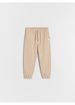 Reserved - Spodnie dresowe oversize - beżowy ze sklepu Reserved w kategorii Spodnie i półśpiochy - zdjęcie 161236693