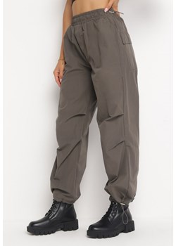 Ciemnobeżowe Spodnie Odanes ze sklepu Born2be Odzież w kategorii Spodnie damskie - zdjęcie 161281133