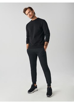 Sinsay - Spodnie dresowe slim jogger - czarny ze sklepu Sinsay w kategorii Spodnie męskie - zdjęcie 161322003