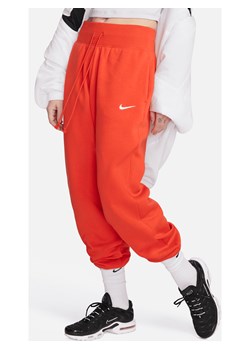 Damskie spodnie dresowe o kroju oversize z wysokim stanem Nike Sportswear Phoenix Fleece - Czerwony ze sklepu Nike poland w kategorii Spodnie damskie - zdjęcie 161519903