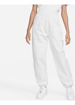 Damskie spodnie z dzianiny Nike Solo Swoosh - Szary ze sklepu Nike poland w kategorii Spodnie damskie - zdjęcie 161520920