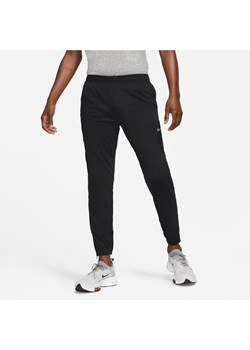 Męskie spodnie do biegania z dzianiny Nike Dri-FIT Challenger - Czerń ze sklepu Nike poland w kategorii Spodnie męskie - zdjęcie 161521690