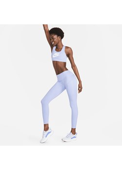 Damskie legginsy ze średnim stanem i kieszeniami o długości 7/8 zapewniające mocne wsparcie Nike Go - Fiolet ze sklepu Nike poland w kategorii Spodnie damskie - zdjęcie 161522040
