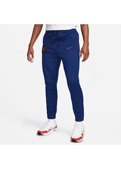 Męskie dzianinowe spodnie piłkarskie Holandia - Niebieski ze sklepu Nike poland w kategorii Spodnie męskie - zdjęcie 161524450