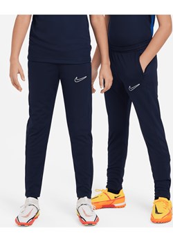 Dziecięce spodnie piłkarskie Nike Dri-FIT Academy23 - Niebieski ze sklepu Nike poland w kategorii Spodnie chłopięce - zdjęcie 161526613
