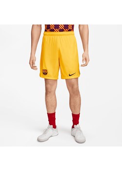 Męskie spodenki piłkarskie Nike Dri-FIT FC Barcelona Stadium 2023/24 (wersja czwarta) - Żółty ze sklepu Nike poland w kategorii Spodenki męskie - zdjęcie 161527171