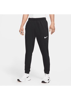 Męskie zwężane spodnie do fitnessu z dzianiny Dri-FIT Nike Dry - Czerń ze sklepu Nike poland w kategorii Spodnie męskie - zdjęcie 161527793