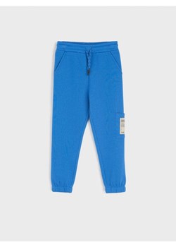 Sinsay - Spodnie dresowe jogger - niebieski ze sklepu Sinsay w kategorii Spodnie chłopięce - zdjęcie 161590982