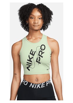 Damska koszulka o skróconym kroju bez rękawów Nike Pro Dri-FIT - Zieleń ze sklepu Nike poland w kategorii Bluzki damskie - zdjęcie 161610451