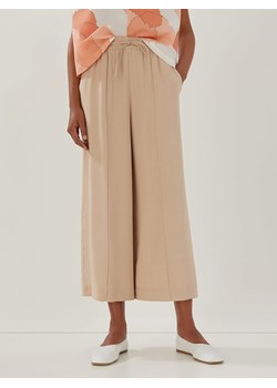 Someday Spodnie &quot;Calex&quot; w kolorze beżowym ze sklepu Limango Polska w kategorii Spodnie damskie - zdjęcie 161774793