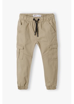Spodnie typu bojówki dla niemowlaka beżowe ze sklepu 5.10.15 w kategorii Spodnie i półśpiochy - zdjęcie 161988570