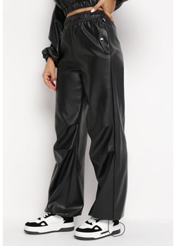 Czarne Szerokie Spodnie z Imitacji Skóry z Gumką w Pasie Lundria ze sklepu Born2be Odzież w kategorii Spodnie damskie - zdjęcie 162356441