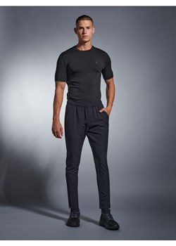 Sinsay - Spodnie dresowe SNSY PERFORMANCE - czarny ze sklepu Sinsay w kategorii Spodnie męskie - zdjęcie 162521601
