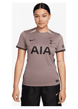 Damska koszulka piłkarska Nike Dri-FIT Tottenham Hotspur Stadium 2023/24 (wersja trzecia) - Brązowy ze sklepu Nike poland w kategorii Bluzki damskie - zdjęcie 162532281