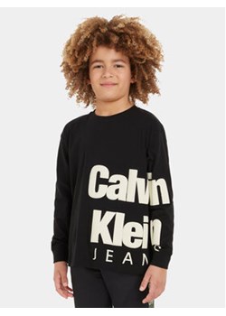 Calvin Klein Jeans Bluzka Blown Up Logo IB0IB01880 Czarny Regular Fit ze sklepu MODIVO w kategorii T-shirty chłopięce - zdjęcie 162535671