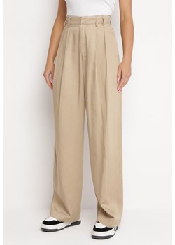 Beżowe Szerokie Spodnie z Kieszeniami Zapinane na Haftkę Tuzette ze sklepu Born2be Odzież w kategorii Spodnie damskie - zdjęcie 162704752