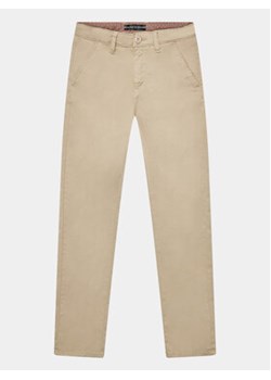 Guess Chinosy L3BB00 WFPMA Beżowy Regular Fit ze sklepu MODIVO w kategorii Spodnie chłopięce - zdjęcie 162735543