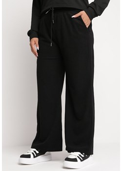 Czarne Szerokie Spodnie z Gumką w Pasie i Wsuwanymi Kieszeniami z Wysokim Stanem Seliduna ze sklepu Born2be Odzież w kategorii Spodnie damskie - zdjęcie 162848401