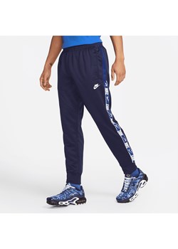 Joggery męskie Nike Sportswear - Niebieski ze sklepu Nike poland w kategorii Spodnie męskie - zdjęcie 163460302