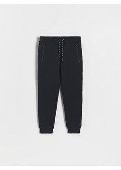 Reserved - Dresowe spodnie jogger - czarny ze sklepu Reserved w kategorii Spodnie chłopięce - zdjęcie 163469813