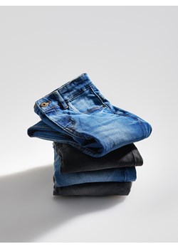 Reserved - Elastyczne jeansy slim - granatowy ze sklepu Reserved w kategorii Spodnie chłopięce - zdjęcie 163470441