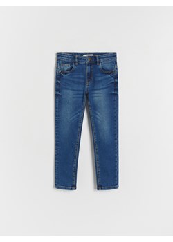 Reserved - Elastyczne jeansy slim - granatowy ze sklepu Reserved w kategorii Spodnie chłopięce - zdjęcie 163525741