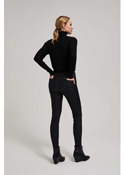 Woskowane spodnie typu rurki czarne ze sklepu Moodo.pl w kategorii Spodnie damskie - zdjęcie 163536620