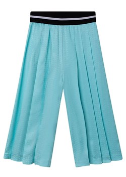 DKNY Spodnie w kolorze niebieskim ze sklepu Limango Polska w kategorii Spodnie dziewczęce - zdjęcie 163745942