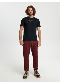 Sinsay - Spodnie dresowe jogger - czerwony ze sklepu Sinsay w kategorii Spodnie męskie - zdjęcie 163860582