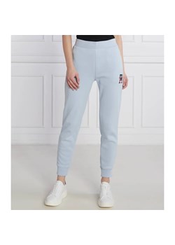 Tommy Hilfiger Spodnie dresowe | Regular Fit ze sklepu Gomez Fashion Store w kategorii Spodnie damskie - zdjęcie 164321624