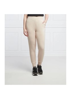GUESS Spodnie dresowe SIMONNE | Regular Fit ze sklepu Gomez Fashion Store w kategorii Spodnie damskie - zdjęcie 164322373