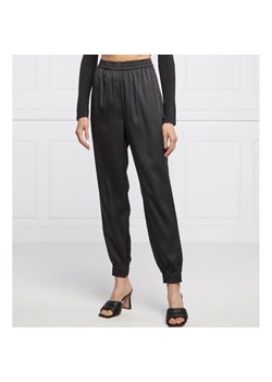 GUESS Spodnie JAY | Loose fit ze sklepu Gomez Fashion Store w kategorii Spodnie damskie - zdjęcie 164323064