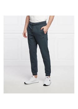 GUESS Spodnie dresowe ADAM | Slim Fit ze sklepu Gomez Fashion Store w kategorii Spodnie męskie - zdjęcie 164324221