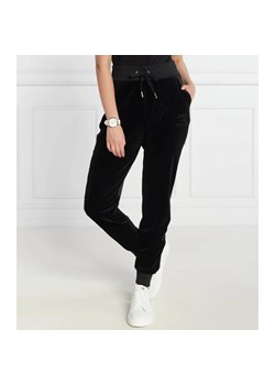Armani Exchange Spodnie dresowe | Regular Fit ze sklepu Gomez Fashion Store w kategorii Spodnie damskie - zdjęcie 164326081