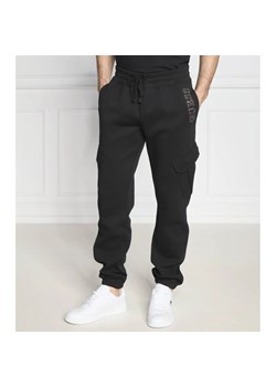 GUESS Spodnie dresowe VIL | Regular Fit ze sklepu Gomez Fashion Store w kategorii Spodnie męskie - zdjęcie 164329714