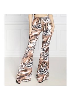 GUESS ACTIVE Spodnie AZALEA | flare fit ze sklepu Gomez Fashion Store w kategorii Spodnie damskie - zdjęcie 164331662