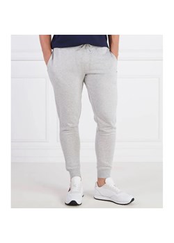 Tommy Jeans Spodnie dresowe TJM SLIM FLEECE SWEA | Slim Fit ze sklepu Gomez Fashion Store w kategorii Spodnie męskie - zdjęcie 164331990