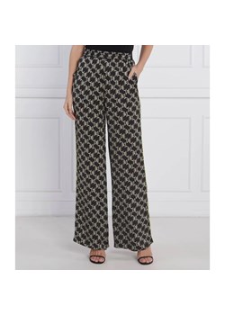Karl Lagerfeld Spodnie PRINTED MONOGRAM | flare fit | high waist ze sklepu Gomez Fashion Store w kategorii Spodnie damskie - zdjęcie 164333632