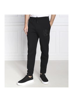 BOSS GREEN Spodnie dresowe BOSS X LOONEY TUNES Halboa Lunar | Regular Fit ze sklepu Gomez Fashion Store w kategorii Spodnie męskie - zdjęcie 164336381