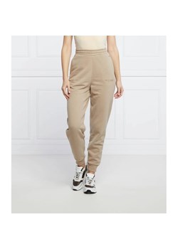 Tommy Hilfiger Spodnie dresowe | Regular Fit ze sklepu Gomez Fashion Store w kategorii Spodnie damskie - zdjęcie 164338693