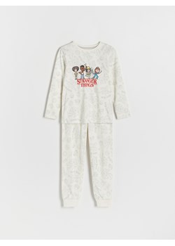 Reserved - Dwuczęściowa piżama Stranger Things - złamana biel ze sklepu Reserved w kategorii Piżamy dziecięce - zdjęcie 164452232