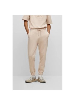 HUGO Spodnie dresowe Dchard | Regular Fit ze sklepu Gomez Fashion Store w kategorii Spodnie męskie - zdjęcie 164898312