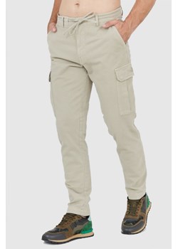 AERONAUTICA MILITARE Beżowe spodnie męskie, Wybierz rozmiar 46 ze sklepu outfit.pl w kategorii Spodnie męskie - zdjęcie 165007003