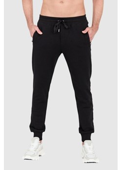 DOLCE & GABBANA Czarne spodnie dresowe z haftowanym logo, Wybierz rozmiar 50 ze sklepu outfit.pl w kategorii Spodnie męskie - zdjęcie 165009023