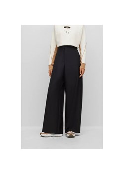 BOSS BLACK Wełniane spodnie Tilwida Alica | flare fit ze sklepu Gomez Fashion Store w kategorii Spodnie damskie - zdjęcie 165173432