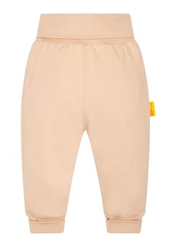 Steiff Spodnie dresowe w kolorze beżowym ze sklepu Limango Polska w kategorii Spodnie i półśpiochy - zdjęcie 165214324