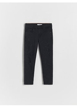 Reserved - Jeansy slim z przetarciami - czarny ze sklepu Reserved w kategorii Spodnie chłopięce - zdjęcie 165425822
