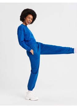 Sinsay - Spodnie dresowe - niebieski ze sklepu Sinsay w kategorii Spodnie damskie - zdjęcie 165427094